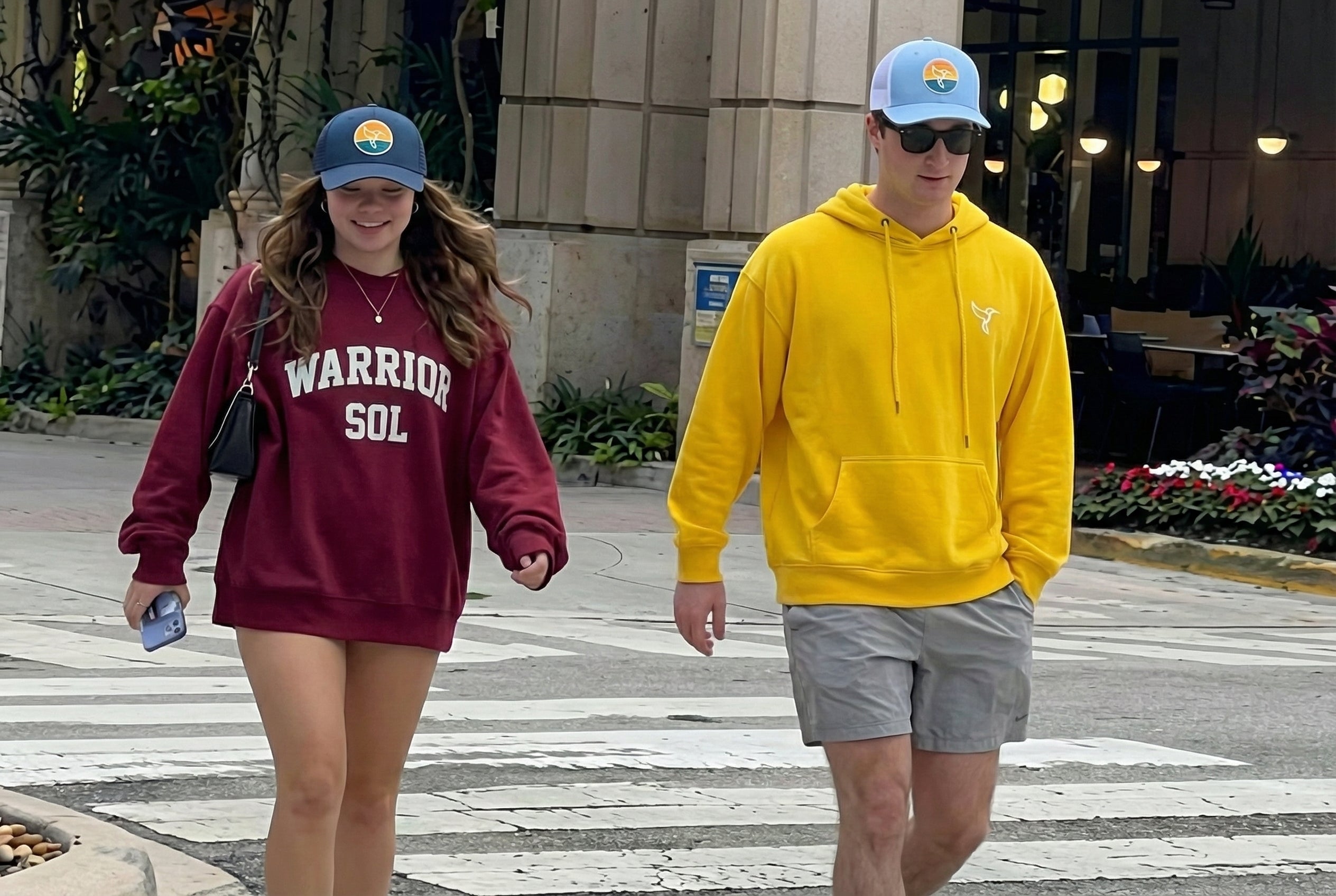 Warrior Sol lifestyle - Cole and Ani walking Las Olas street style