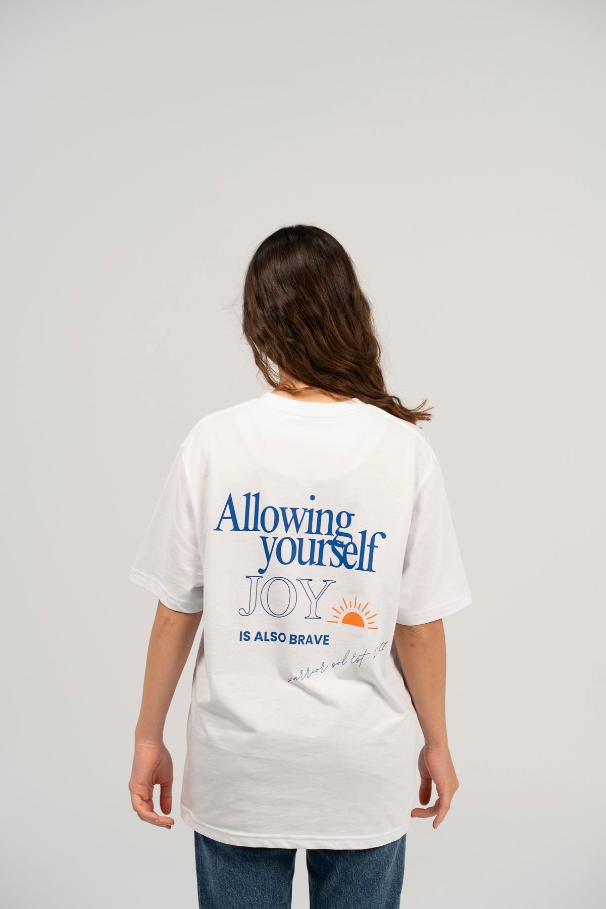 Warrior Sol Allowing Joy T-Shirt - lifestyle photo | mission-driven cancer support apparel