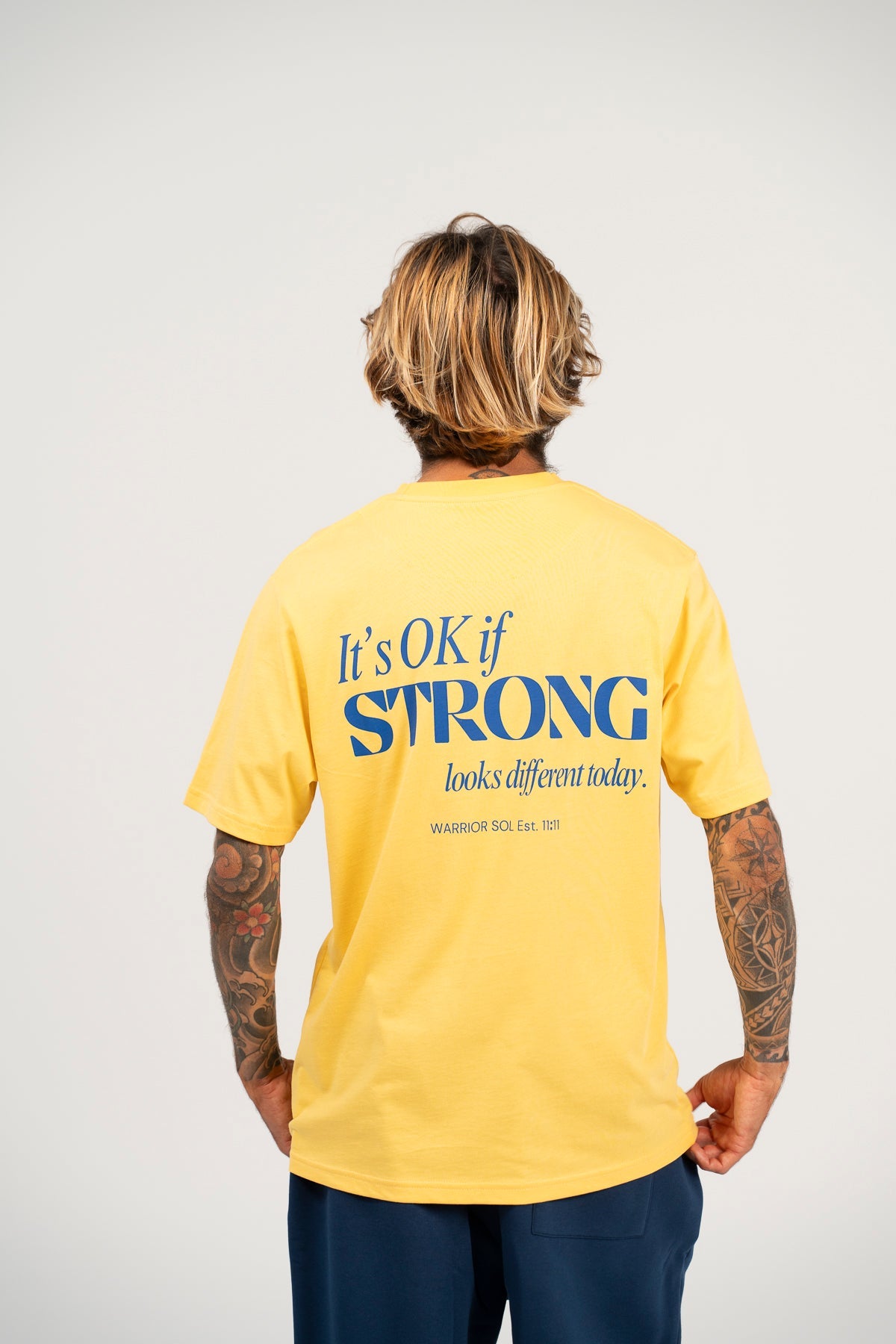 Warrior Sol Being Strong T-Shirt - lifestyle photo | mission-driven cancer support apparel