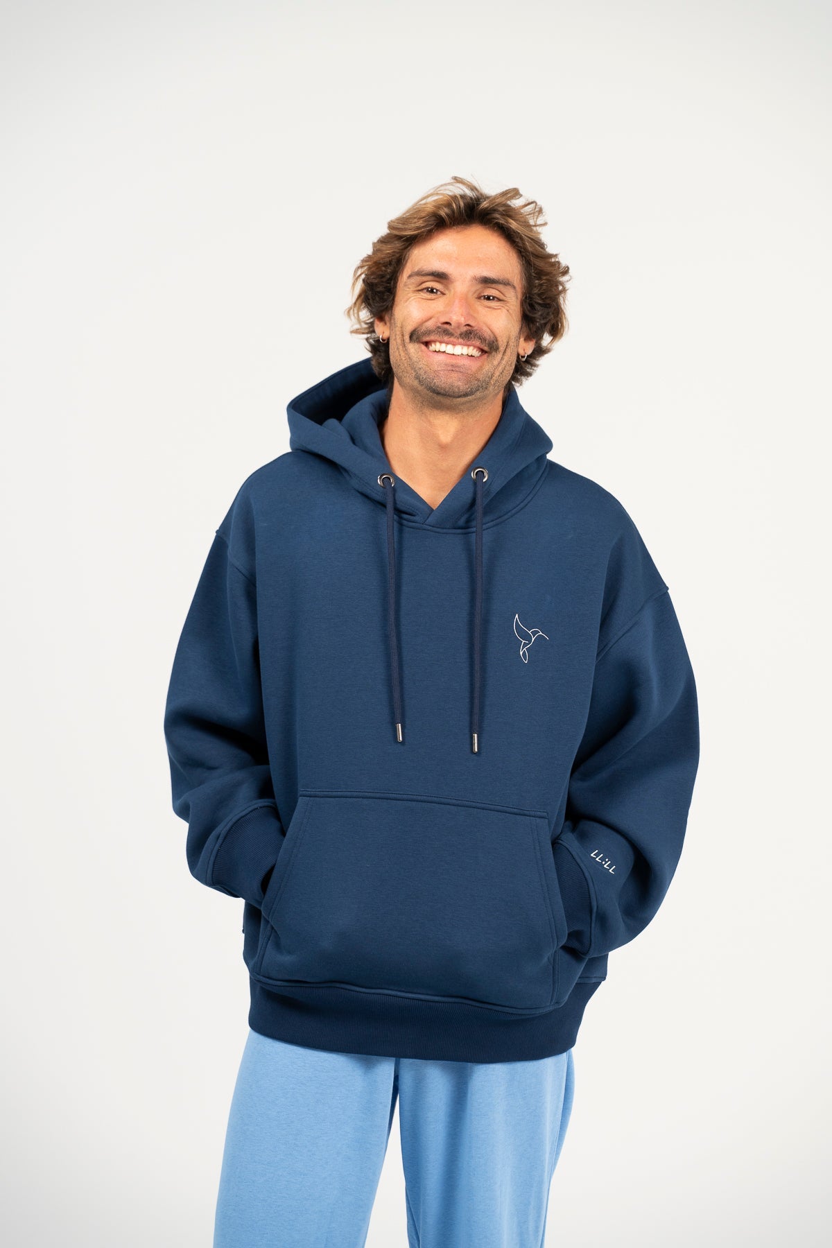 Warrior Sol Warrior Pullover Hoodie - lifestyle photo | mission-driven cancer support apparel