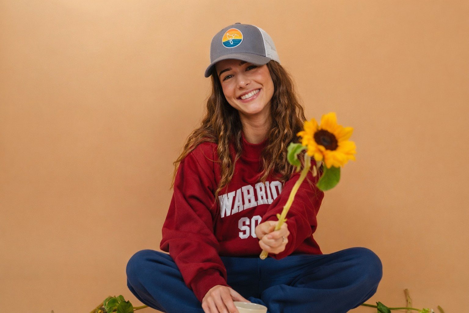 Backwards hat and a sunflower