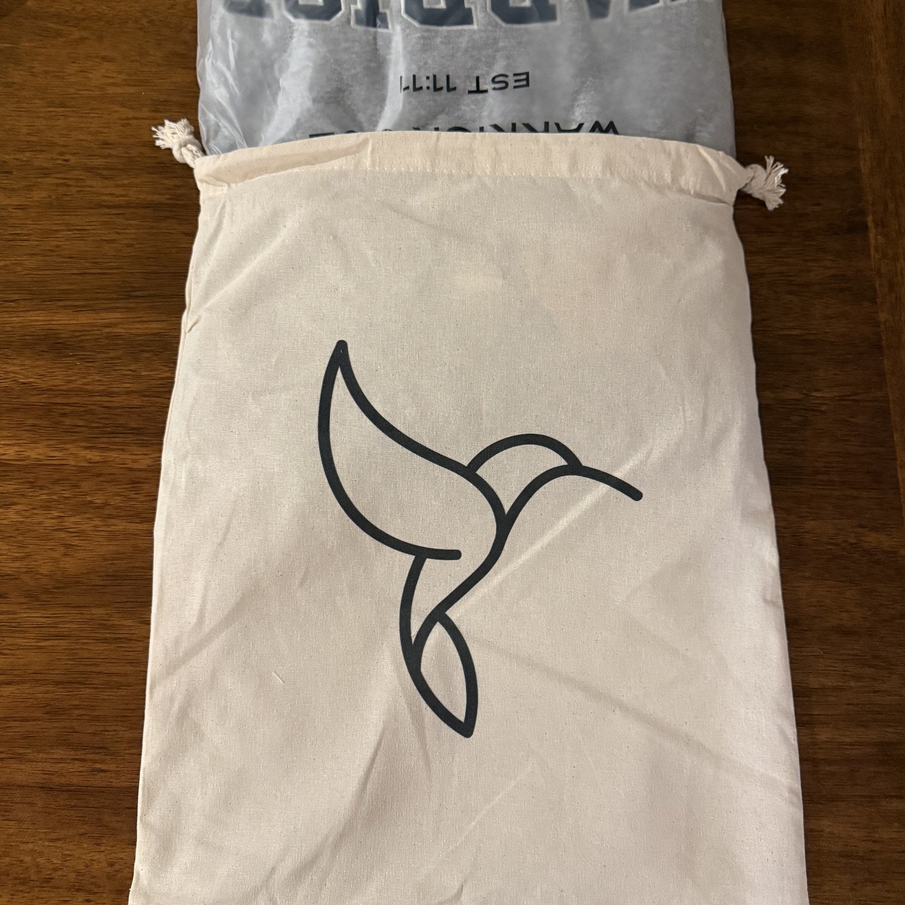 Varsity mockneck tucked in the hummingbird bag
